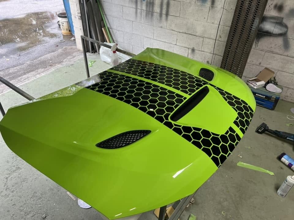 The hood laid out, stripe and scoop finished