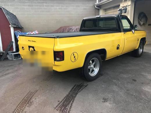 A square-body C10 in yellow and black