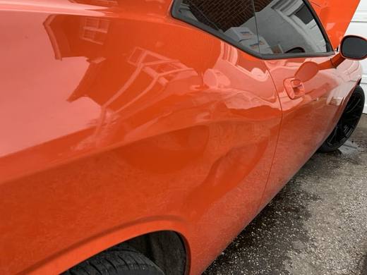 An orange Challenger, freshly finished