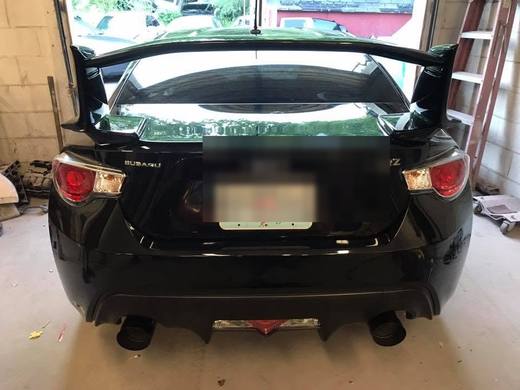 A black BRZ from the rear