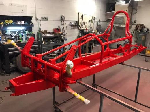The red frame back on its wheels