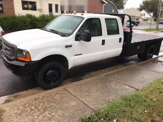 The flatbed fitted to a white F-350